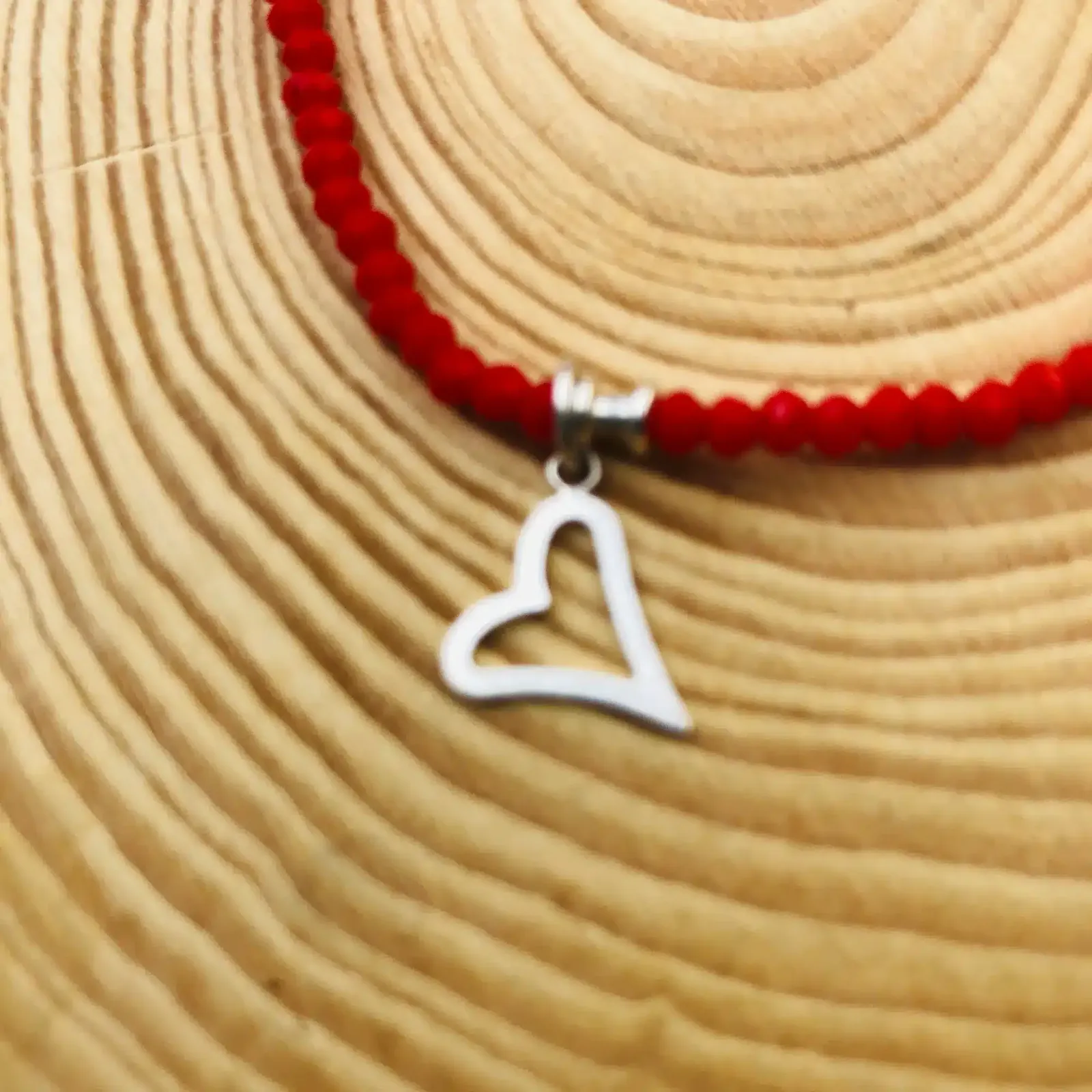 Pulsera cristales rojos y colgante de corazón plata 925